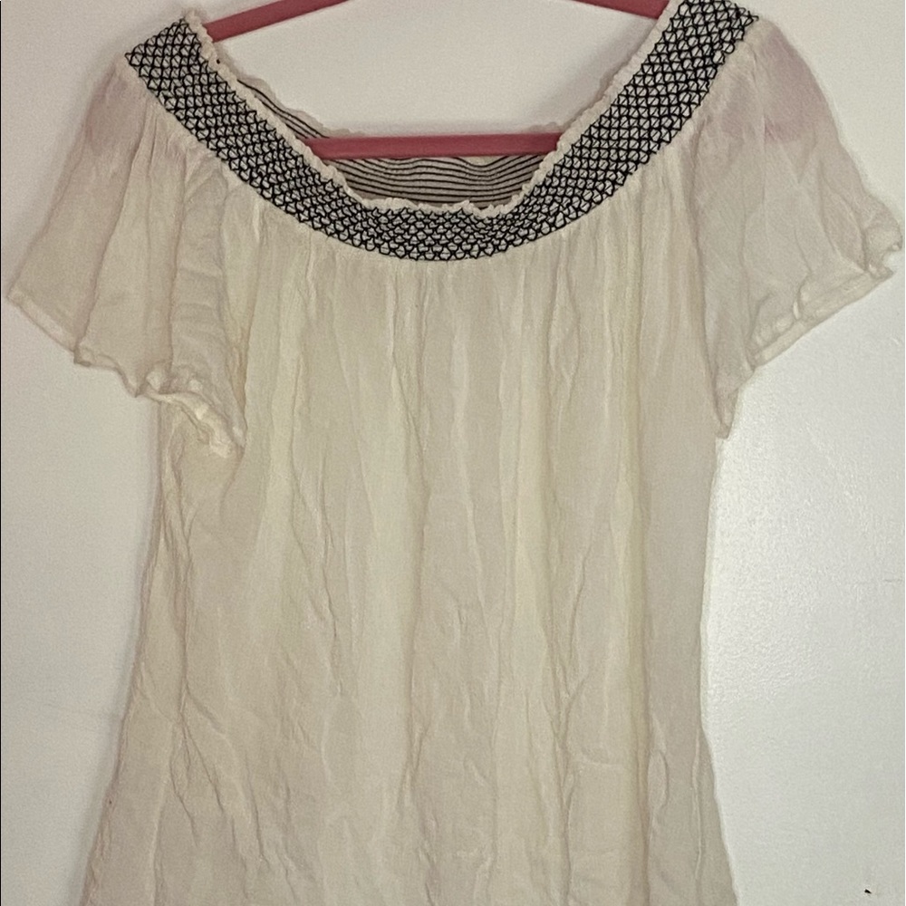 off the shoulders black and white shirt
